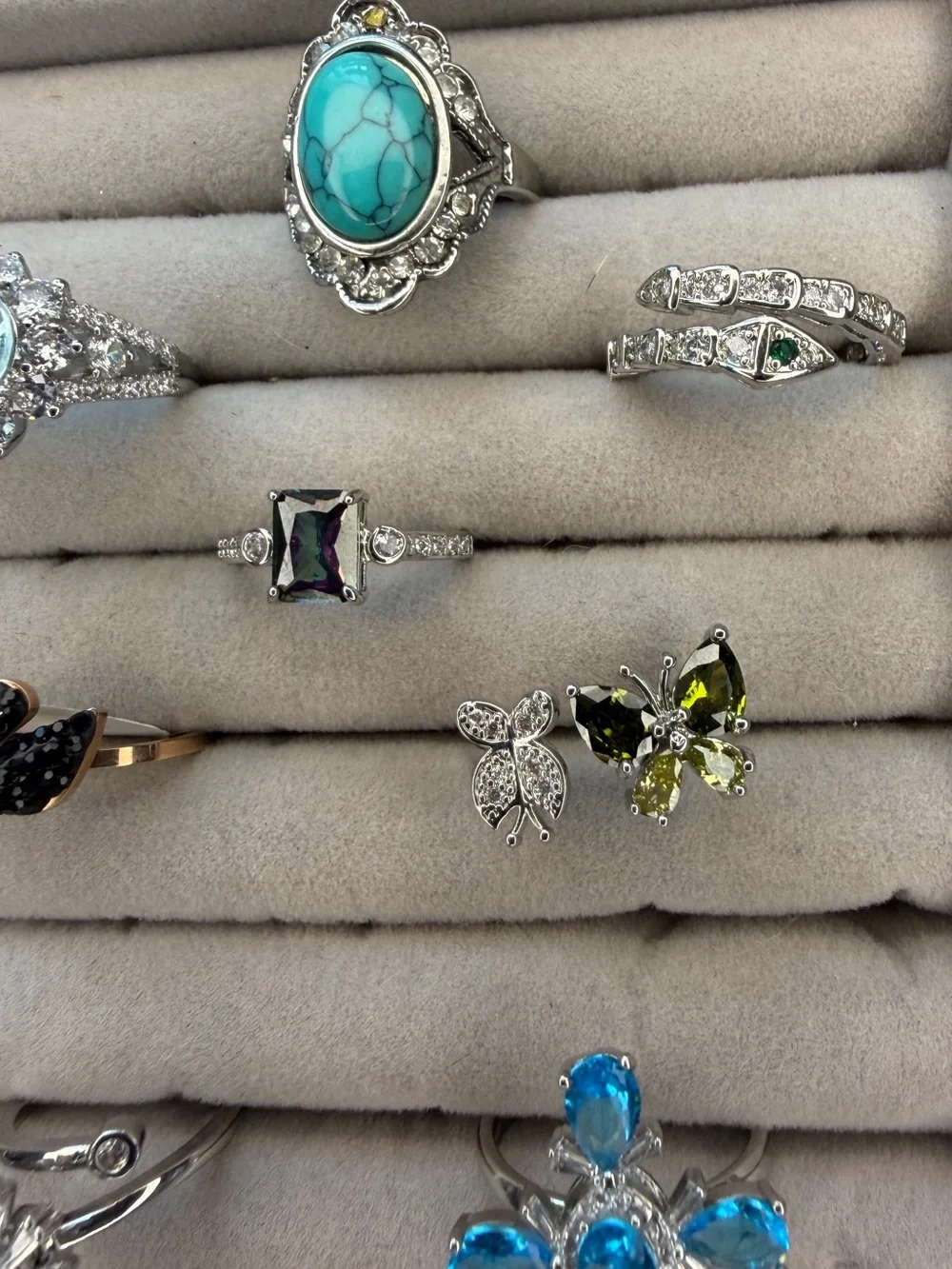 Lot of eight Silver tone Rings-adjustable or size 6-8